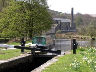 At Lock 31E looking North with Cellars Clough Mill in the distance